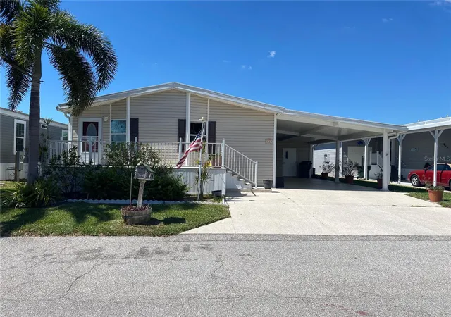 Photo 2 of Manufactured home for sale at 724 Blackburn Blvd, North Port, FL 34287 | MLS# N6143502 | Listing updated on 2026-09-14
