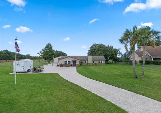 Photo 3 of Single family home for sale at 2921 Lake Tohopekaliga Blvd, Kissimmee, FL 34746 | MLS# O6393654 | Listing updated on 2026-09-25