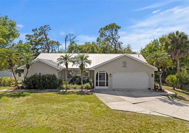 Photo 1 of Single family home for sale at 935 Baer Ave Nw, Port Charlotte, FL 33948 | MLS# A4687632 | Listing updated on 2026-10-01
