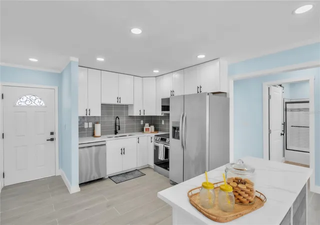 Photo 3 of Single family home for sale at 445 63rd Street, Holmes Beach, FL 34217 | MLS# A4688793 | Listing updated on 2026-09-22