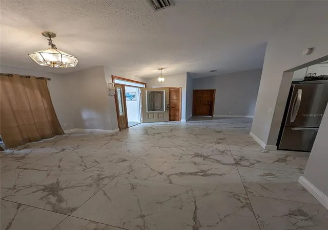 Photo 4 of Single family home for sale at 2106 Whitlock Pl, Dover, FL 33527 | MLS# TB8493968 | Listing updated on 2026-09-26