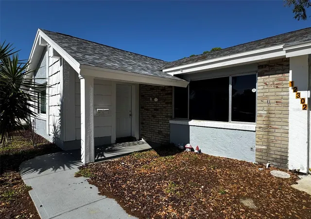 Photo 3 of Single family home for sale at 12302 Cobble Stone Dr, Hudson, FL 34667 | MLS# TB8495397 | Listing updated on 2026-09-14