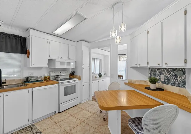 Photo 3 of Manufactured home for sale at 485 Loma Linda, North Port, FL 34287 | MLS# TB8497105 | Listing updated on 2026-09-22
