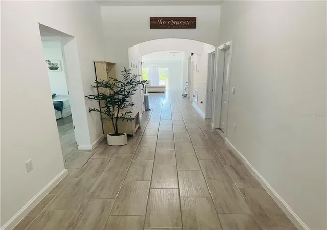 Photo 3 of Single family home for sale at 1409 Hillsborough Way, Kissimmee, FL 34759 | MLS# O6399957 | Listing updated on 2026-09-15