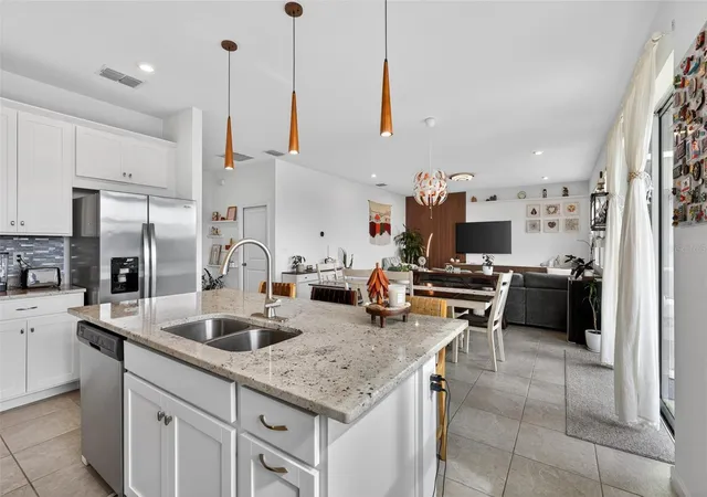 Photo 3 of Single family home for sale at 1181 Lakeshore Breeze Pl, Kissimmee, FL 34747 | MLS# O6399978 | Listing updated on 2026-09-14