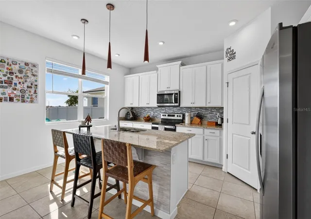 Photo 3 of Single family home for sale at 1181 Lakeshore Breeze Pl, Kissimmee, FL 34747 | MLS# O6399978 | Listing updated on 2026-09-14