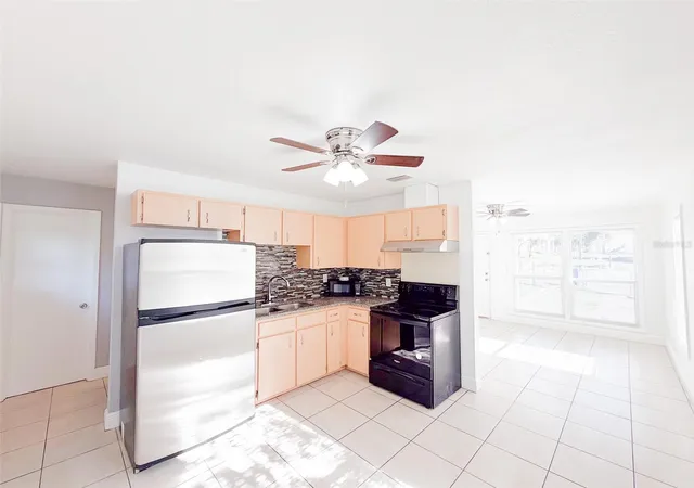 Photo 4 of Single family home for sale at 407 W Bella Vista St, Lakeland, FL 33805 | MLS# O6400401 | Listing updated on 2026-09-09