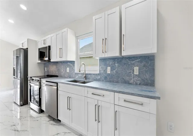 Photo 3 of Single family home for sale at 11708 Carrollwood Cvs Dr, Tampa, FL 33624 | MLS# TB8500297 | Listing updated on 2026-09-15