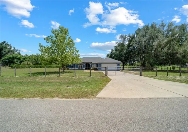Photo 2 of Single family home for sale at 11985 Se 123rd Avenue, Ocklawaha, FL 32179 | MLS# OM723337 | Listing updated on 2026-09-23