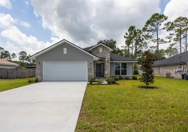 Photo 1 of Single family home for sale at 54 Pony Express Dr, Palm Coast, FL 32164 | MLS# FC318024 | Listing updated on 2026-10-25