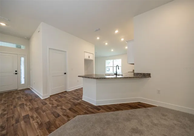 Photo 2 of Single family home for sale at 54 Pony Express Dr, Palm Coast, FL 32164 | MLS# FC318024 | Listing updated on 2026-10-25