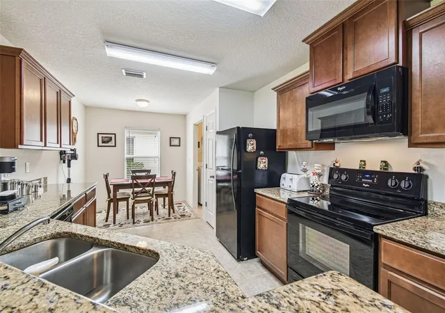 Photo 4 of Single family home for sale at 30821 Water Lily Dr, Brooksville, FL 34602 | MLS# TB8502423 | Listing updated on 2026-10-15
