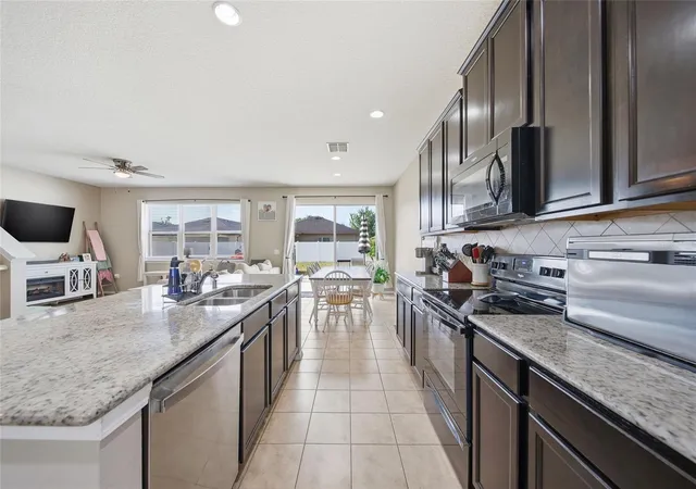 Photo 3 of Single family home for sale at 15476 Stone House Dr, Brooksville, FL 34604 | MLS# TB8503383 | Listing updated on 2026-09-15