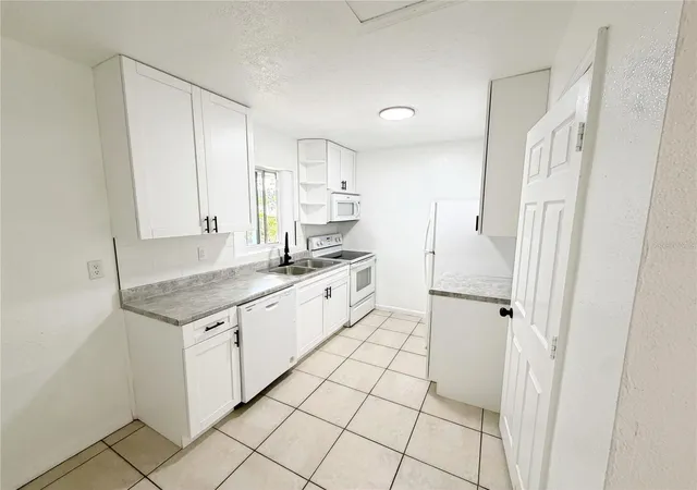 Photo 3 of Single family home for sale at 3916 E Genesee St, Tampa, FL 33610 | MLS# TB8505801 | Listing updated on 2026-10-01