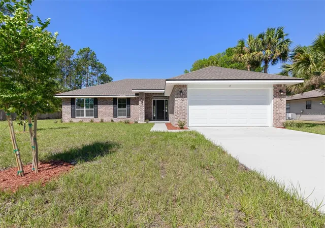 Photo 1 of Single family home for sale at 105 Palmwood Dr, Palm Coast, FL 32164 | MLS# FC318347 | Listing updated on 2026-10-03