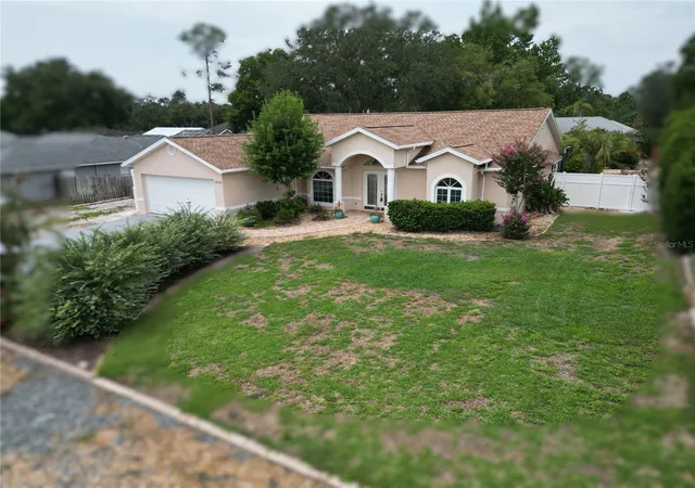 Photo 1 of Single family home for sale at 12125 Knotty Pine Loop, San Antonio, FL 33576 | MLS# TB8509654 | Listing updated on 2026-09-25