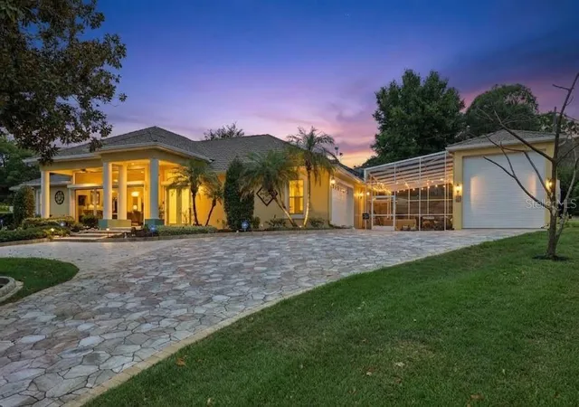 Photo 1 of Single family home for sale at 12128 Lakeshore Dr, Clermont, FL 34711 | MLS# O6409257 | Listing updated on 2026-10-14