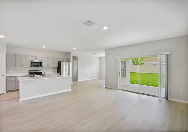 Photo 2 of Single family home for sale at 31670 Baronne St, Wesley Chapel, FL 33545 | MLS# TB8511234 | Listing updated on 2026-09-15