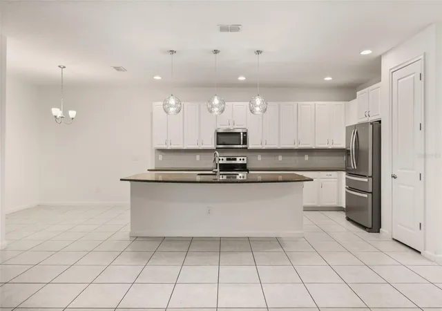 Photo 4 of Single family home for sale at 1078 Castlevecchio Loop, Orlando, FL 32825 | MLS# O6410084 | Listing updated on 2026-09-25