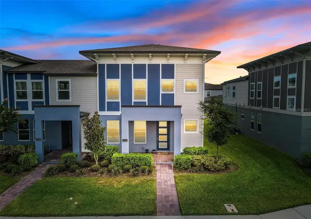 Photo 1 of Townhouse for sale at 7043 Carrickbend Ln, Orlando, FL 32819 | MLS# O6410150 | Listing updated on 2026-09-23