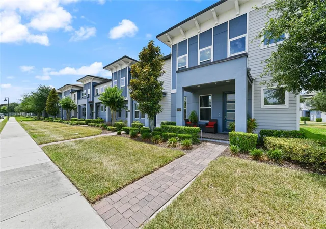 Photo 3 of Townhouse for sale at 7043 Carrickbend Ln, Orlando, FL 32819 | MLS# O6410150 | Listing updated on 2026-09-23