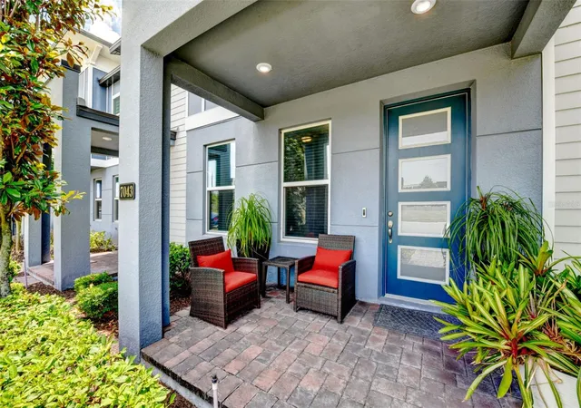 Photo 3 of Townhouse for sale at 7043 Carrickbend Ln, Orlando, FL 32819 | MLS# O6410150 | Listing updated on 2026-09-23