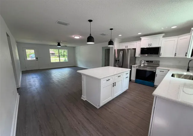 Photo 4 of Single family home for sale at 13953 Southeast 51st Ct, Summerfield, FL 34491 | MLS# OM725249 | Listing updated on 2026-09-15