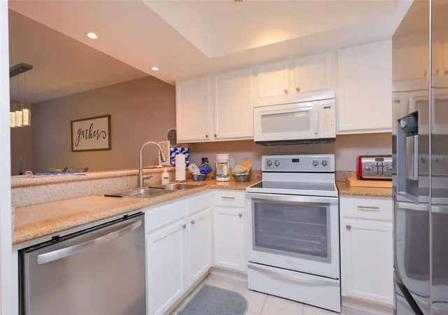 Photo 3 of Townhouse for sale at 2135 Water Mania Ct, Kissimmee, FL 34746 | MLS# O6410366 | Listing updated on 2026-09-14