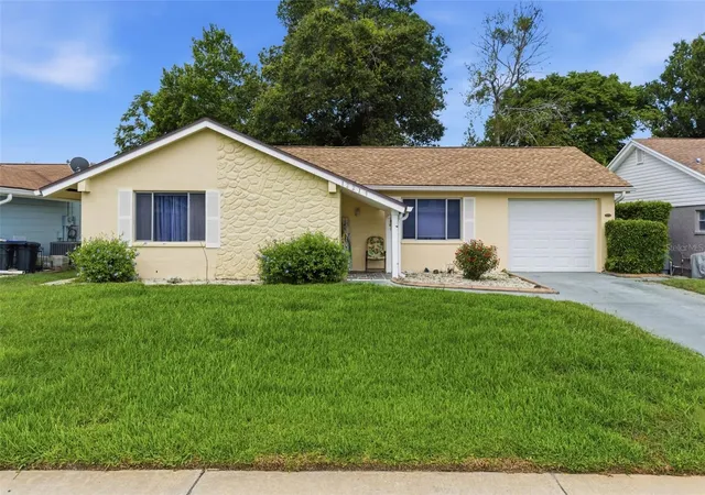 Photo 1 of Single family home for sale at 12219 Quail Run Row, Hudson, FL 34667 | MLS# W7886181 | Listing updated on 2026-09-15