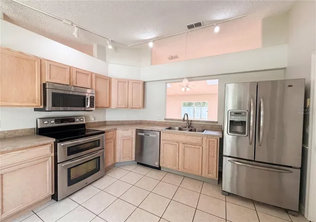 Photo 2 of Single family home for sale at 1360 Wildberry Ln, Deltona, FL 32725 | MLS# O6411787 | Listing updated on 2026-10-09
