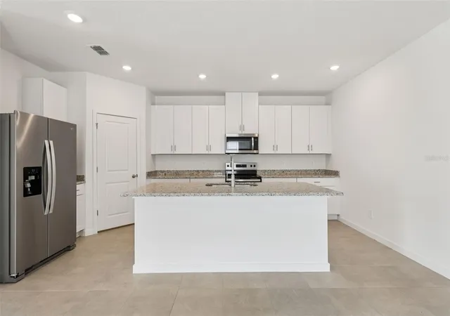 Photo 3 of Sale Pending at 77 Wandering Crk Way, Palm Coast, FL 32164 | MLS# TB8514217 | Listing updated on 2026-09-11