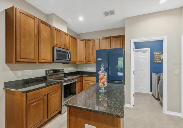 Photo 3 of Single family home for sale at 10859 Breaking Rocks Dr, Tampa, FL 33647 | MLS# TB8514335 | Listing updated on 2026-10-01