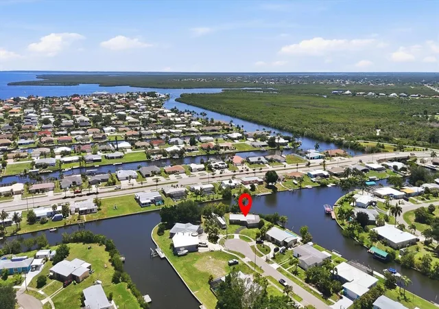 Single family home for sale at 108 Buckeye Ave NW, PORT CHARLOTTE, FL 33952 | MLS# D6147662