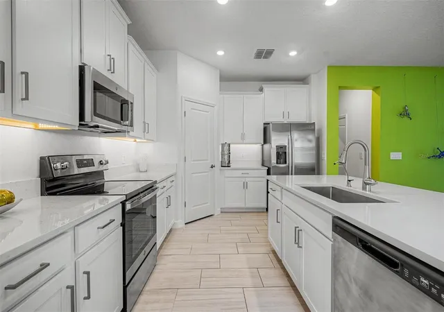 Photo 4 of Single family home for sale at 10733 Tupper Cay Dr, San Antonio, FL 33576 | MLS# TB8514888 | Listing updated on 2026-09-14