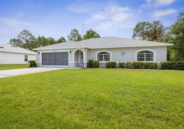 Photo 1 of Single family home for sale at 56 Pritchard Dr, Palm Coast, FL 32164 | MLS# FC319024 | Listing updated on 2026-09-30