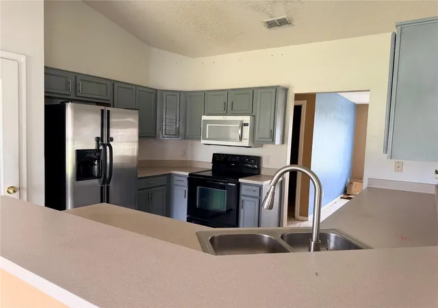 Photo 3 of Single family home for sale at 1713 Minnow Ct, Kissimmee, FL 34759 | MLS# O6413903 | Listing updated on 2026-09-28