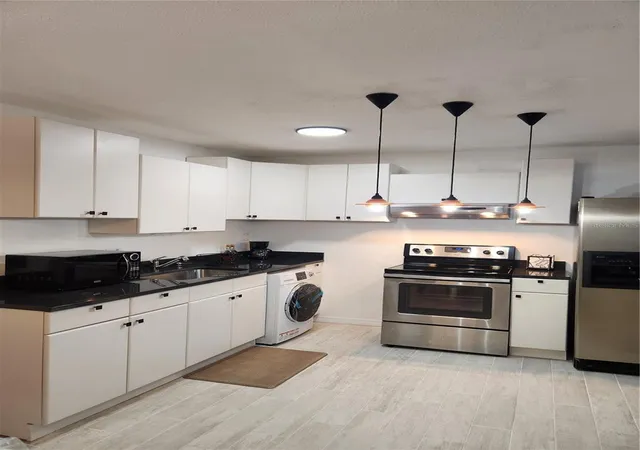Photo 4 of Condo for sale at 9101 W Hillsborough Ave #I209, Tampa, FL 33615 | MLS# TB8516303 | Listing updated on 2026-09-15