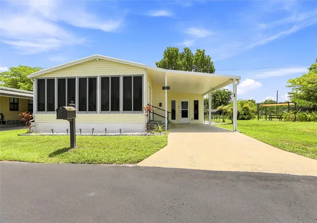 Photo 2 of Manufactured home for sale at 1 Poinsettia Dr, Fort Myers, FL 33905 | MLS# C7527019 | Listing updated on 2026-10-08