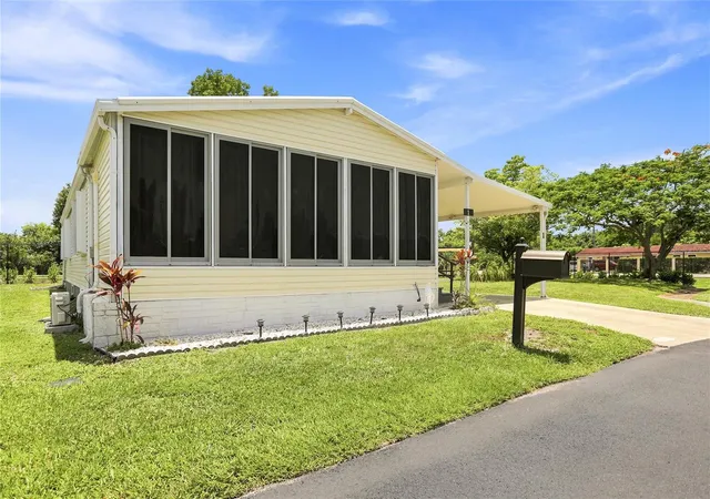 Photo 3 of Manufactured home for sale at 1 Poinsettia Dr, Fort Myers, FL 33905 | MLS# C7527019 | Listing updated on 2026-10-08