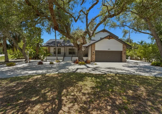 Photo 1 of Single family home for sale at 4074 Redbird Cir, Sarasota, FL 34231 | MLS# A4696502 | Listing updated on 2026-09-12
