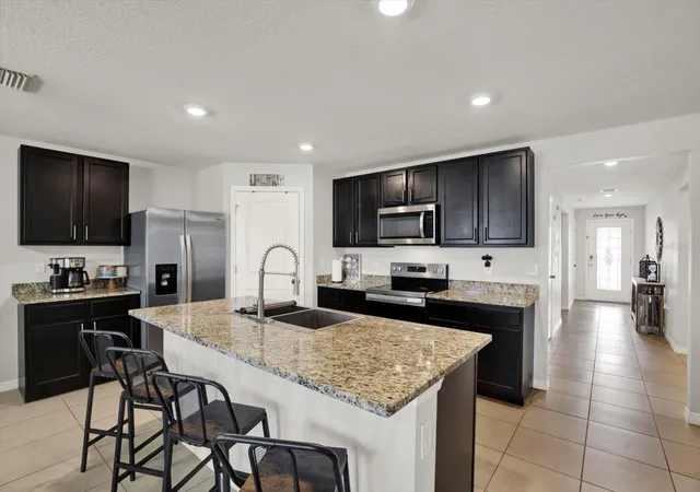 Photo 3 of Single family home for sale at 1013 Tidal Rock Ave, Ruskin, FL 33570 | MLS# TB8517366 | Listing updated on 2026-09-21
