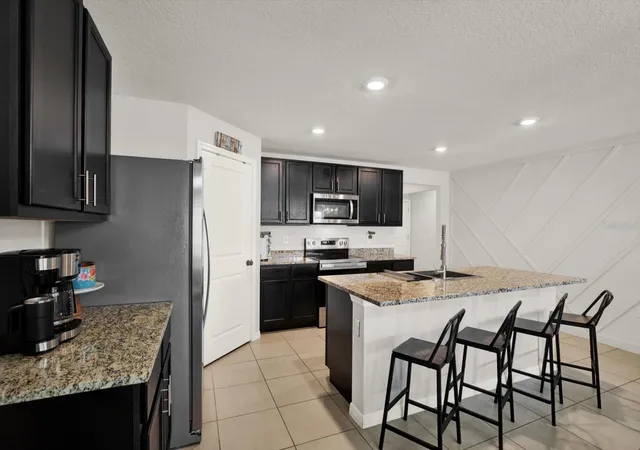 Photo 4 of Single family home for sale at 1013 Tidal Rock Ave, Ruskin, FL 33570 | MLS# TB8517366 | Listing updated on 2026-09-21