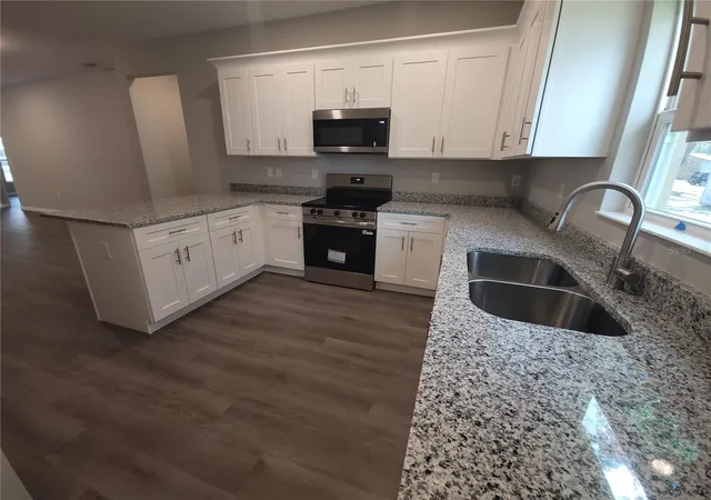Photo 3 of Single family home for sale at 5025 Finders Ct, Tampa, FL 33617 | MLS# TB8517591 | Listing updated on 2026-10-20