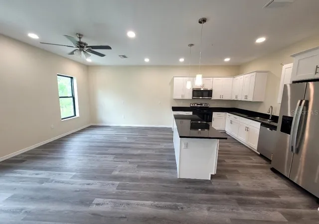 Photo 2 of Townhouse for sale at 4351 Cambio Gdns Ct, Tampa, FL 33610 | MLS# TB8517602 | Listing updated on 2026-09-12