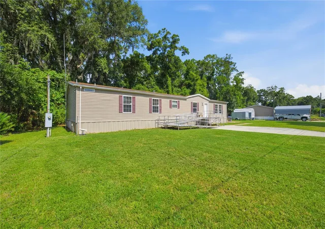 Photo 2 of Manufactured home for sale at 8450 Nw 15th Avenue, Ocala, FL 34475 | MLS# O6415545 | Listing updated on 2026-09-11