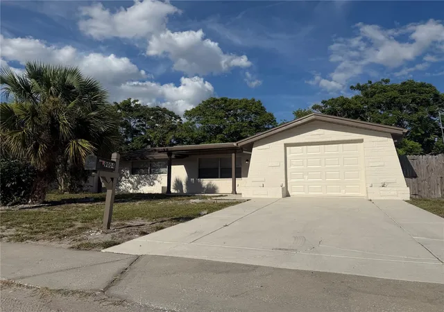 Photo 1 of Single family home for sale at 9004 Saint Regis Ln, Port Richey, FL 34668 | MLS# TB8517877 | Listing updated on 2026-09-29