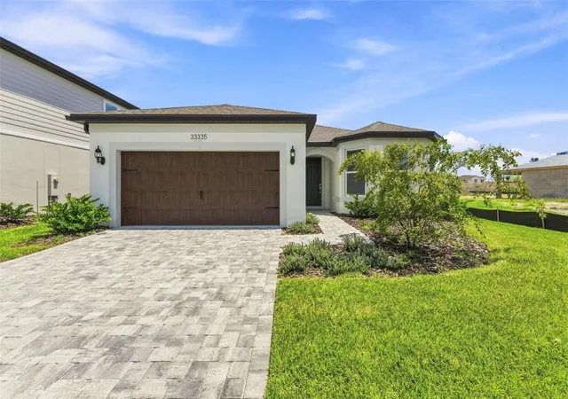 Photo 1 of Single family home for sale at 33335 Herds Hallow Way, WESLEY CHAPEL, FL 33545 | MLS# TB8517949 | Listing updated on 2026-10-09