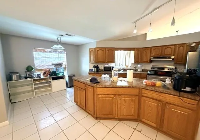 Photo 4 of Single family home for sale at 1677 Sackett Cir, Orlando, FL 32818 | MLS# O6415947 | Listing updated on 2026-09-15