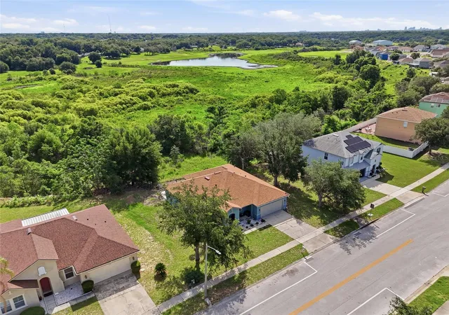 Photo 2 of Single family home for sale at 7254 Country Run Pkwy, Orlando, FL 32818 | MLS# O6416075 | Listing updated on 2026-10-04