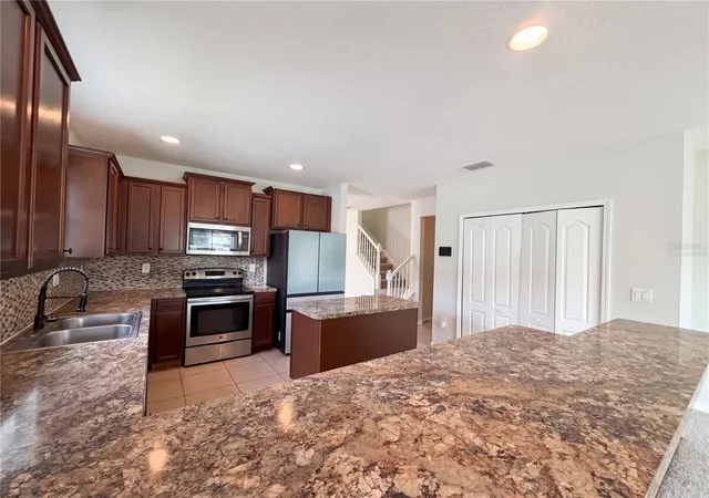 Photo 2 of Single family home for sale at 4876 Grassy Knoll Dr, Tavares, FL 32778 | MLS# O6416211 | Listing updated on 2026-10-03